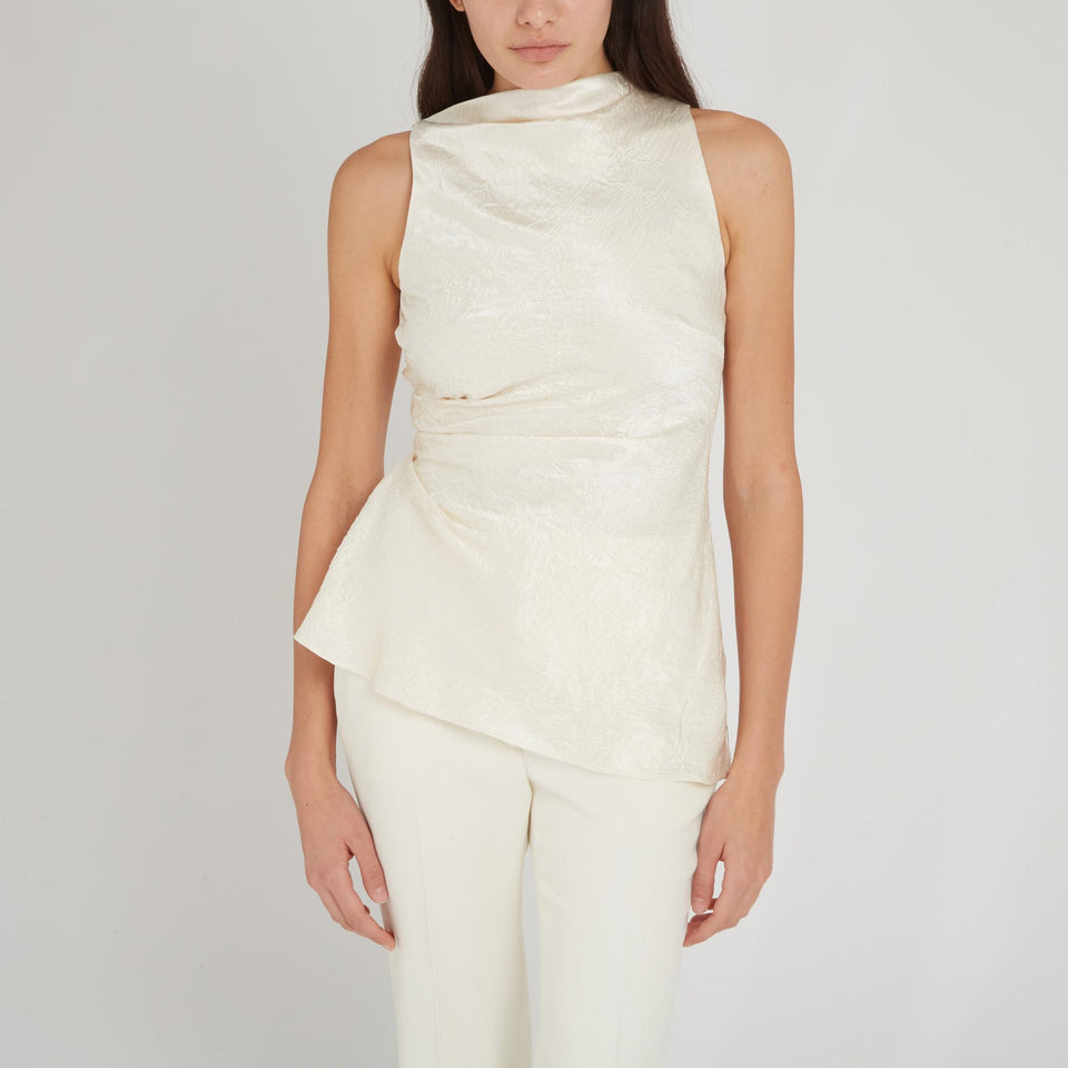 Top asimmetrico in tessuto beige