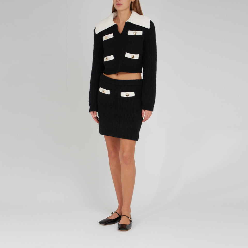 Black fabric sweater