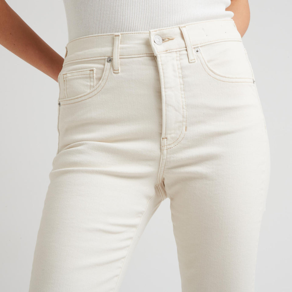 White denim flared jeans