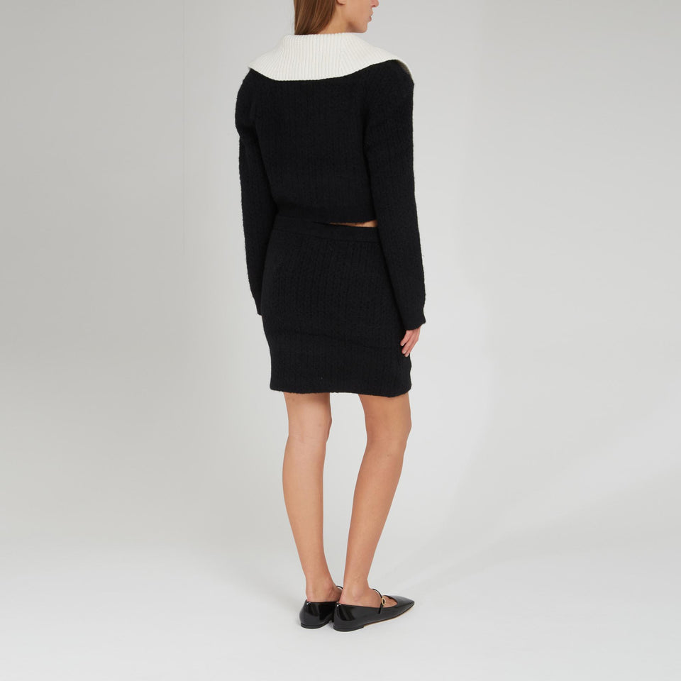 Black fabric sweater