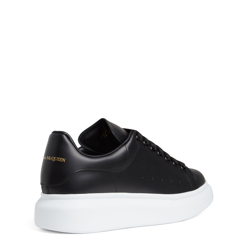 Sneakers oversize in pelle nera