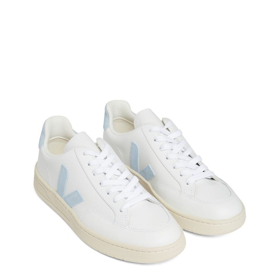 Blue and white leather sneakers