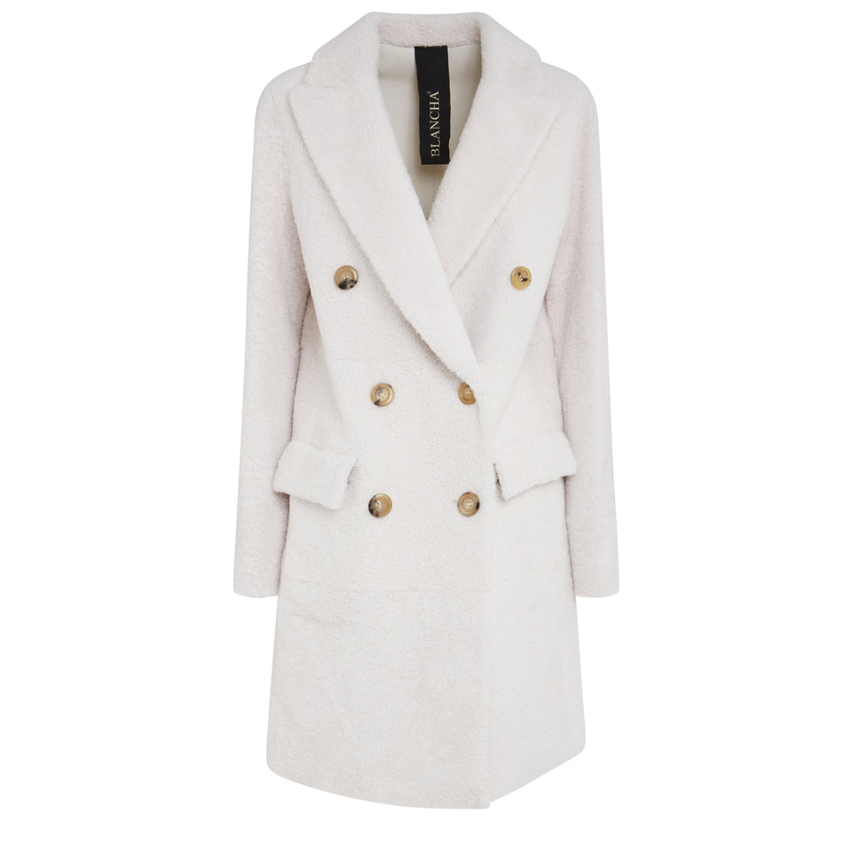 Cappotto in shearling bianco