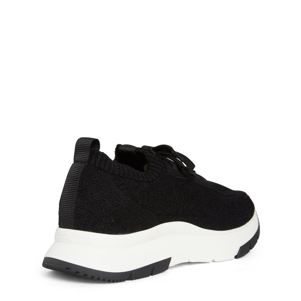 Sneakers in black stretch fabric