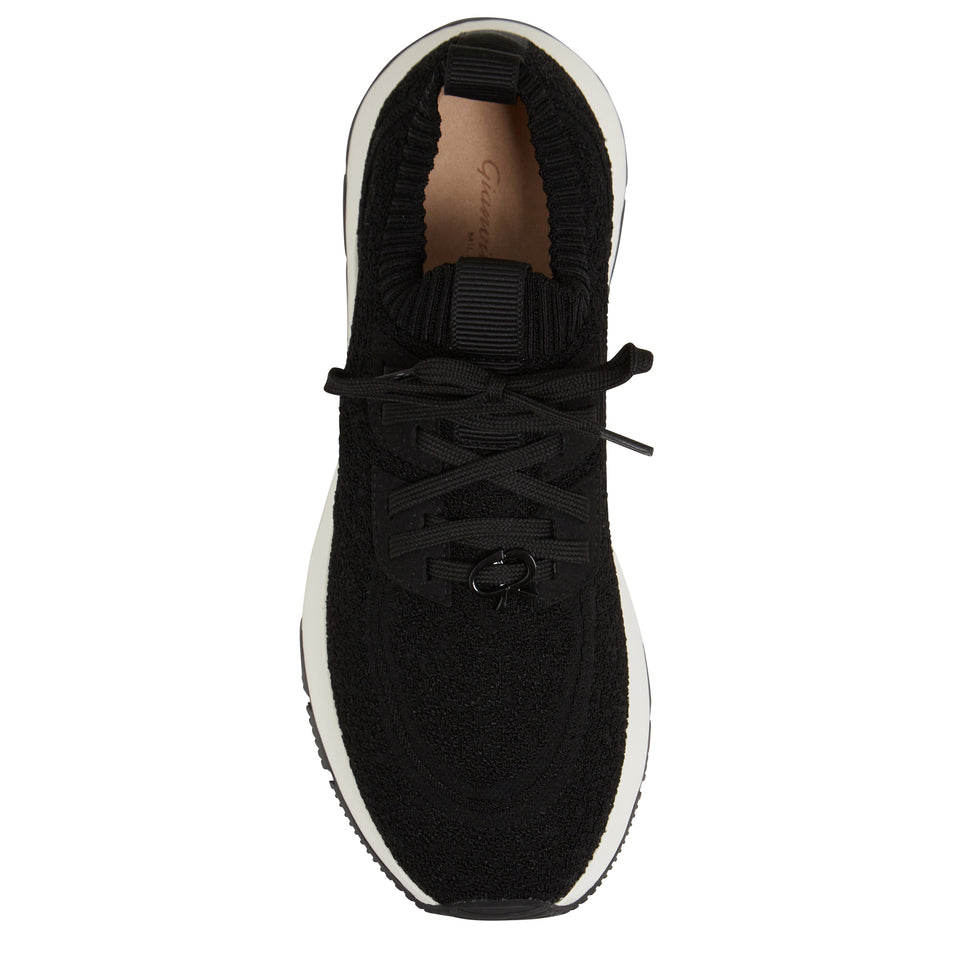 Sneakers in black stretch fabric