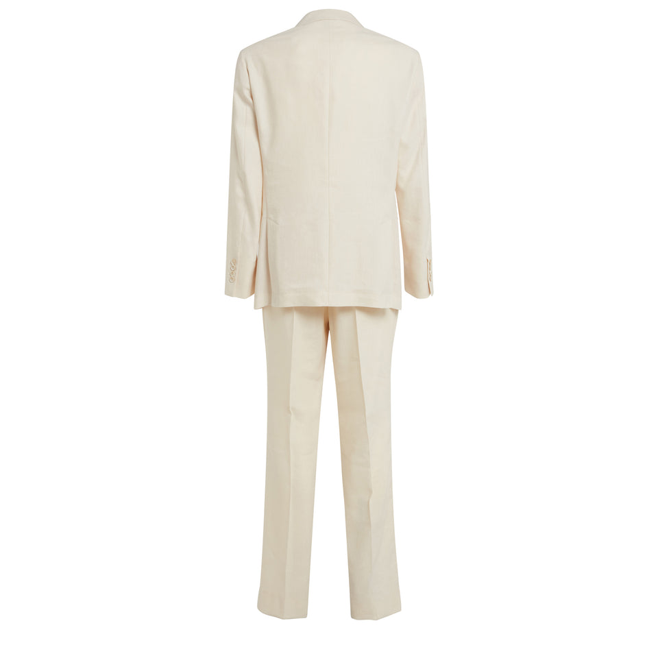 Double-breasted white linen suit