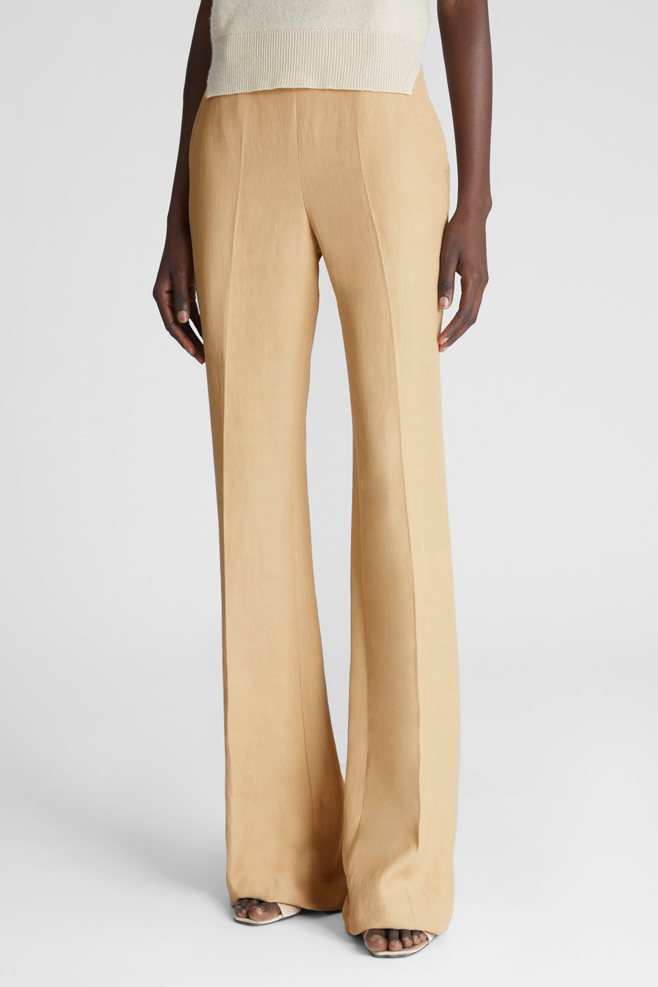 Flared trousers in beige fabric