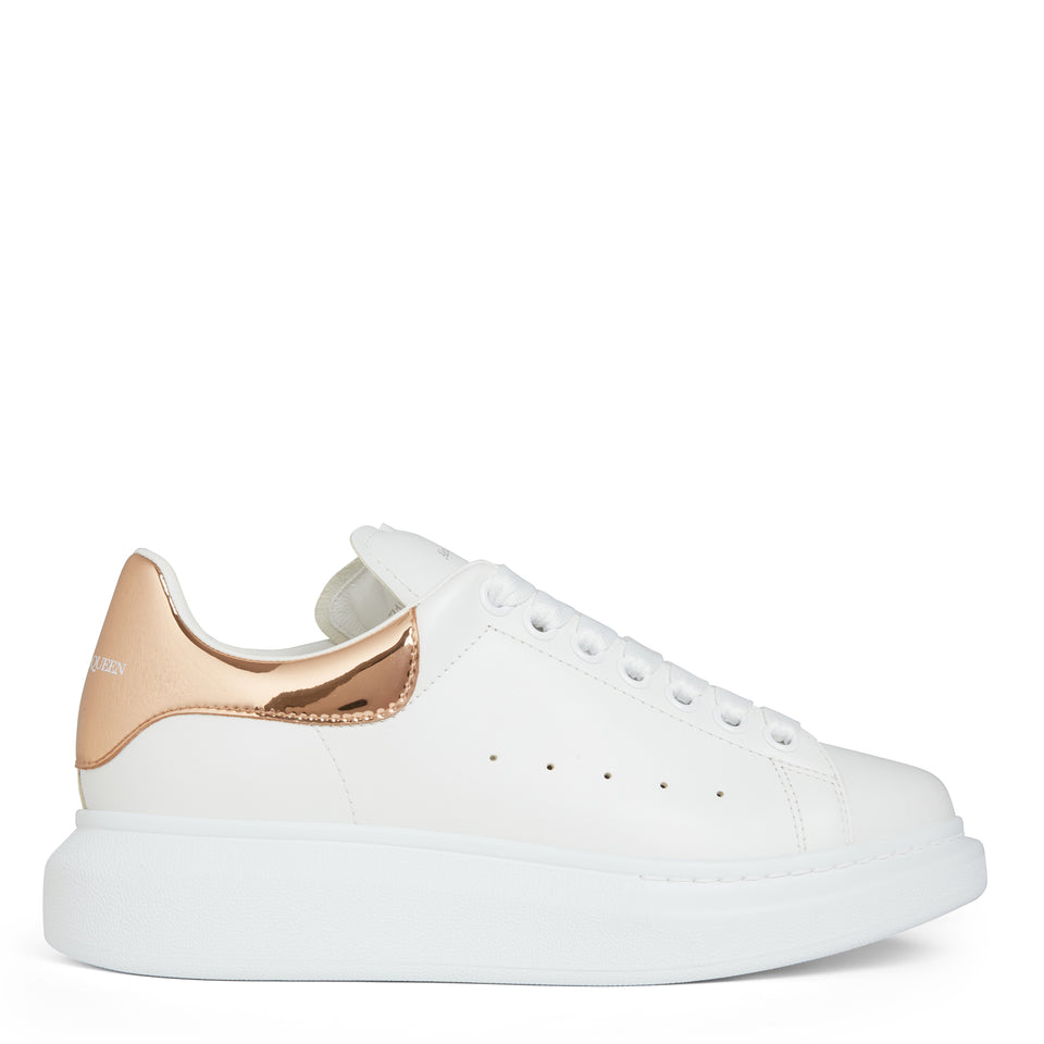 Oversized sneakers in white and gold leather