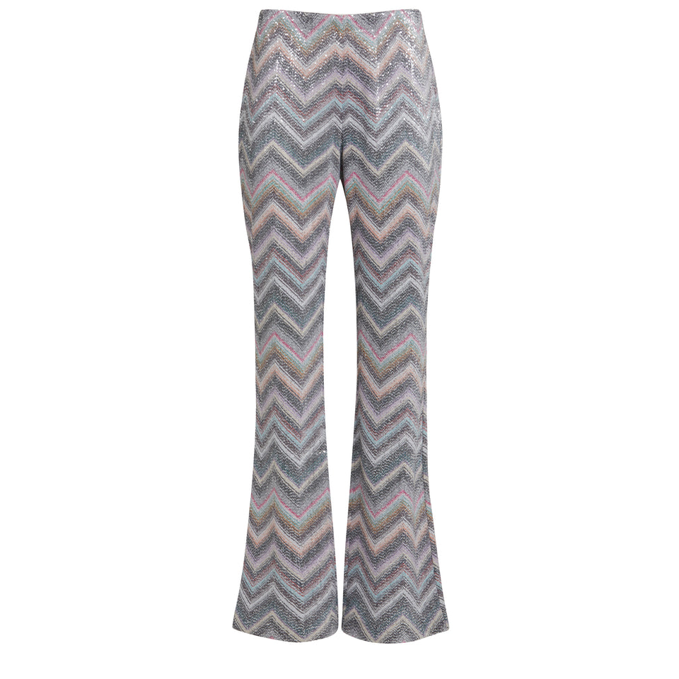 Flared trousers in multicolor fabric