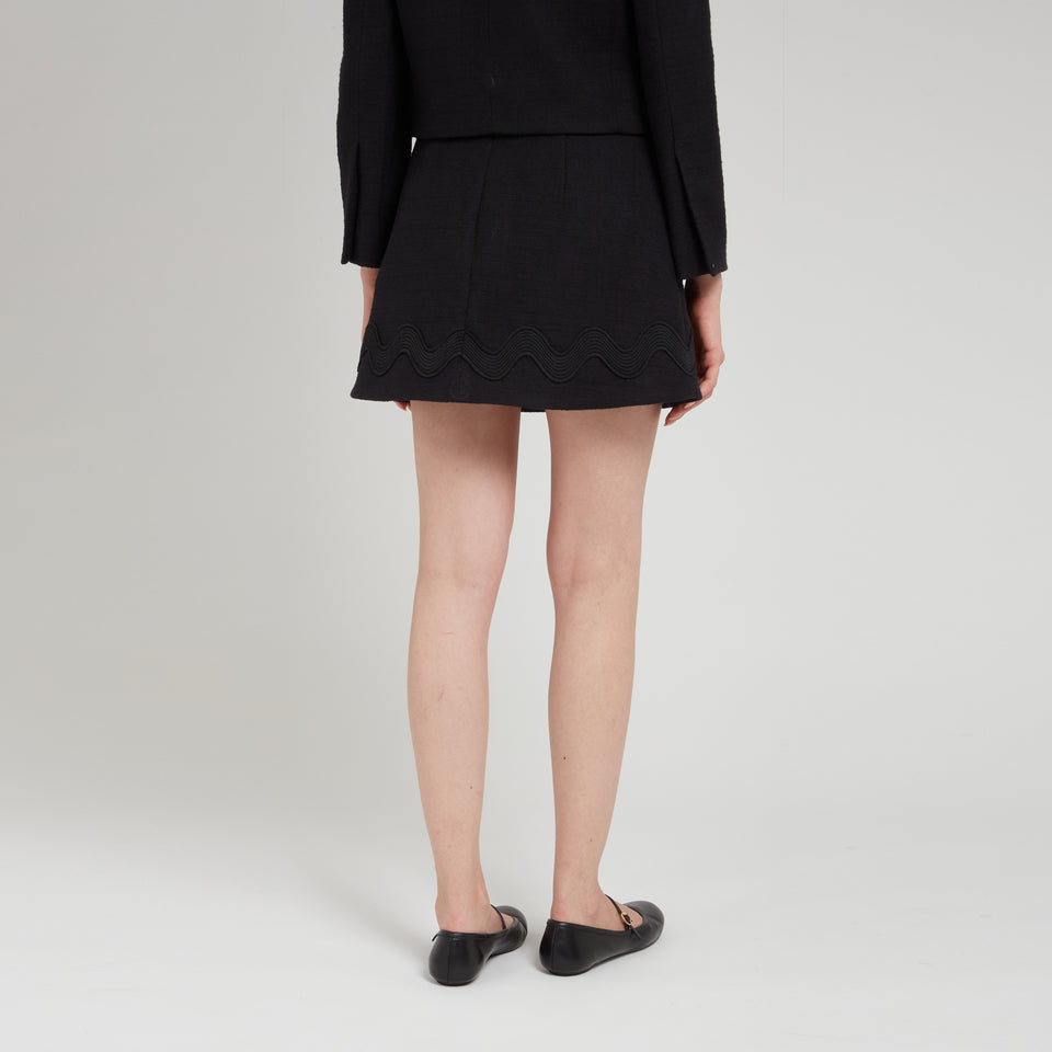 Black cotton mini skirt