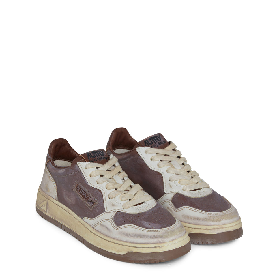 "Sup vint low" sneakers in white and brown leather