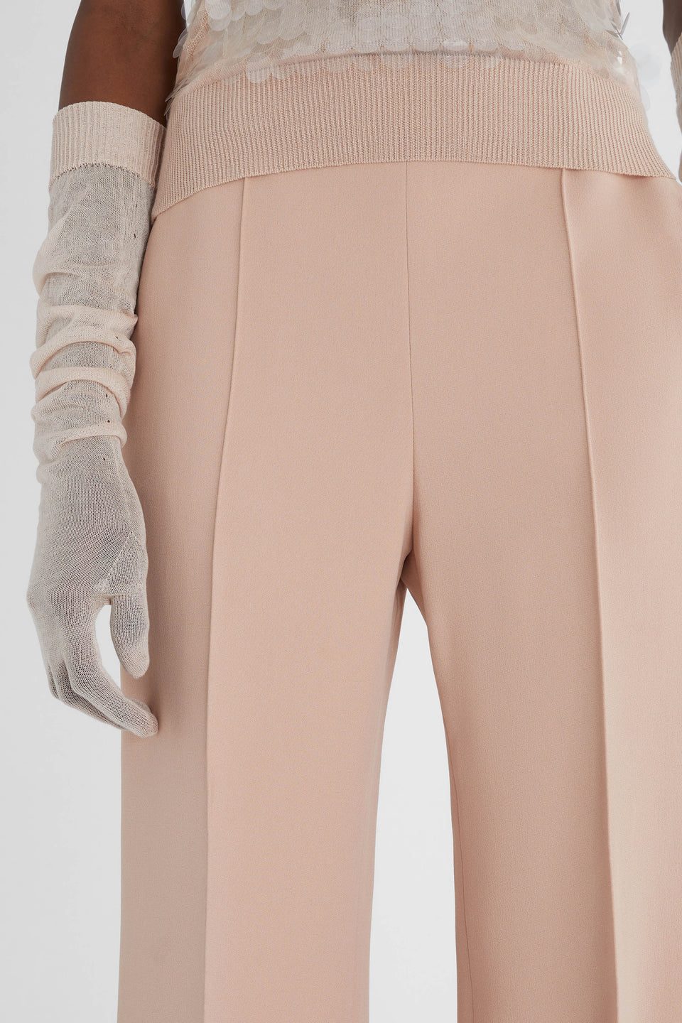 Wide-leg trousers in pink fabric