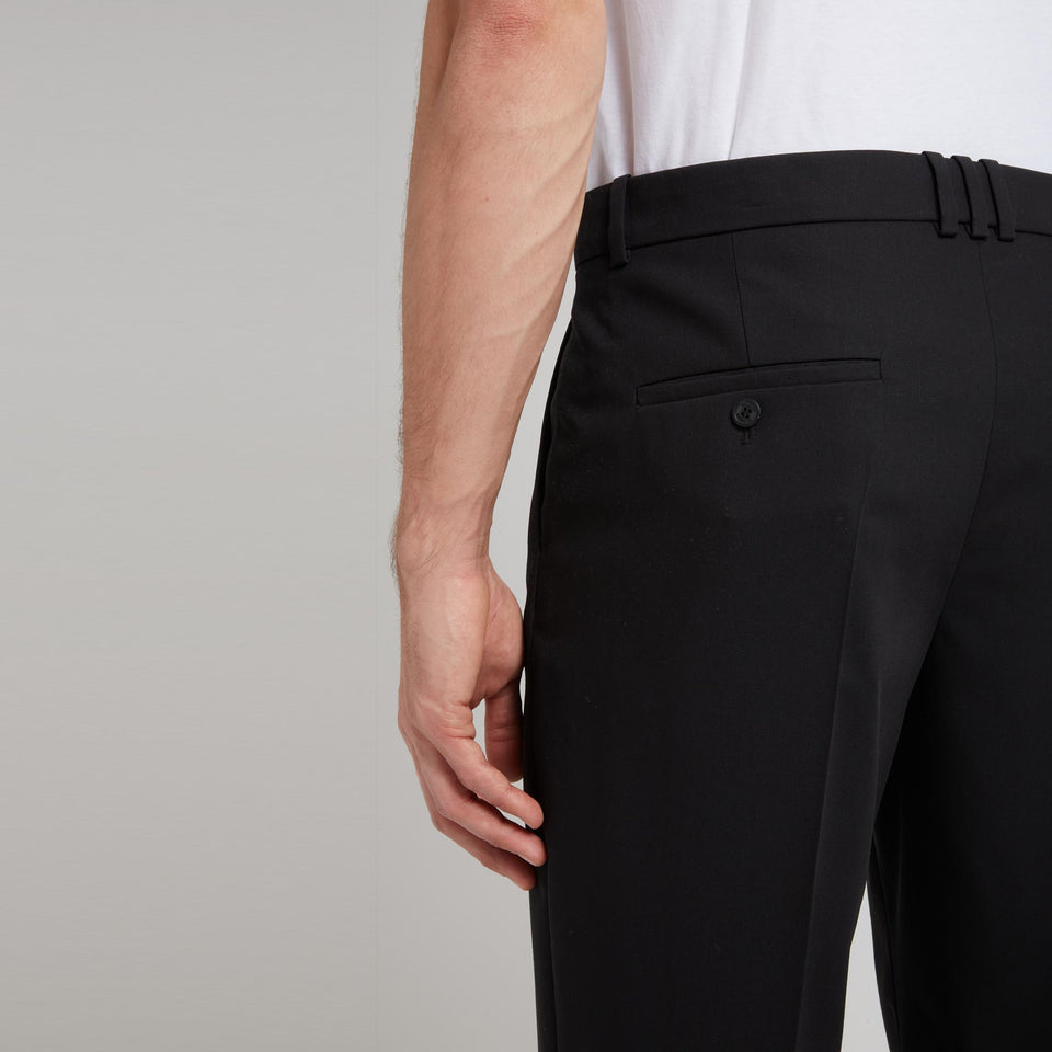 Tailored black wool trousers