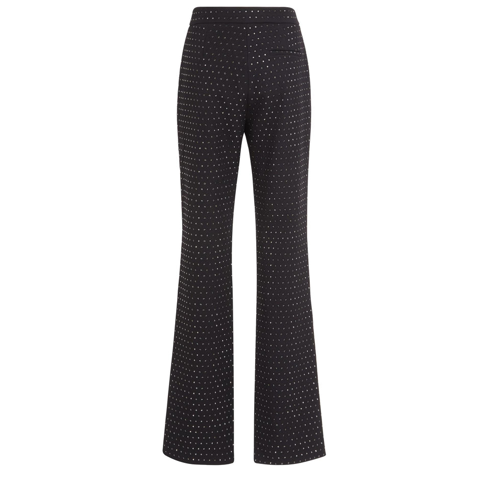 Flared trousers in black fabric