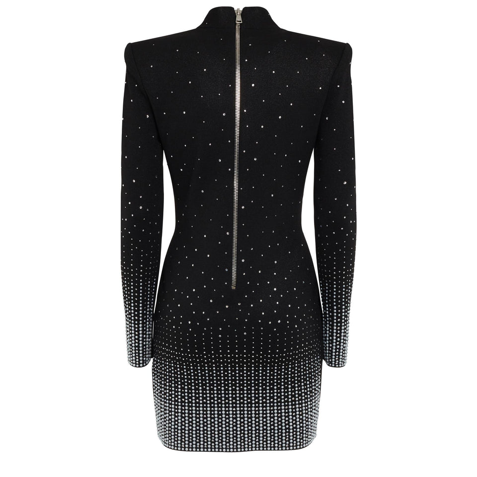 Short dress in black fabric