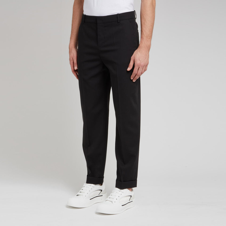 Tailored black wool trousers