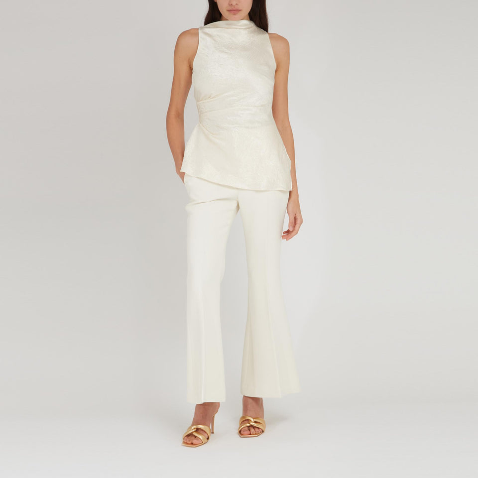 Top asimmetrico in tessuto beige