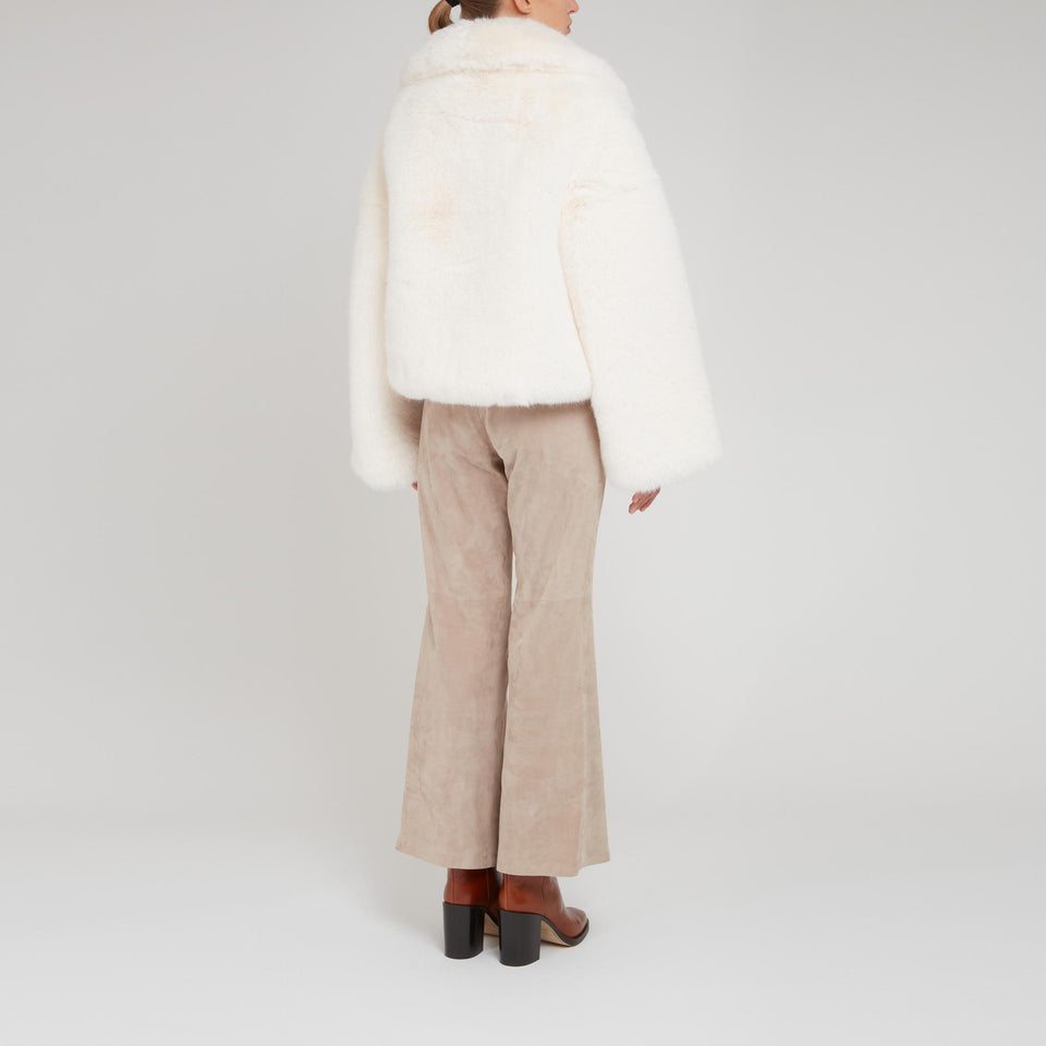 Coat in white shearling