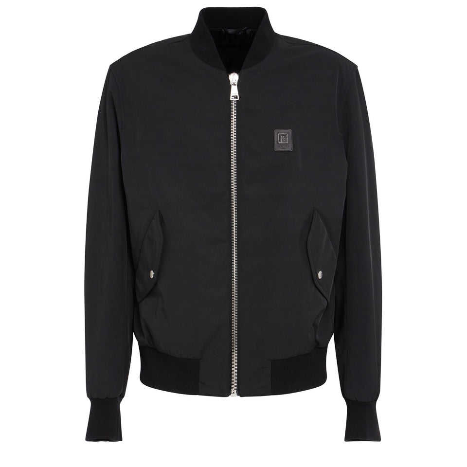 Black fabric bomber jacket