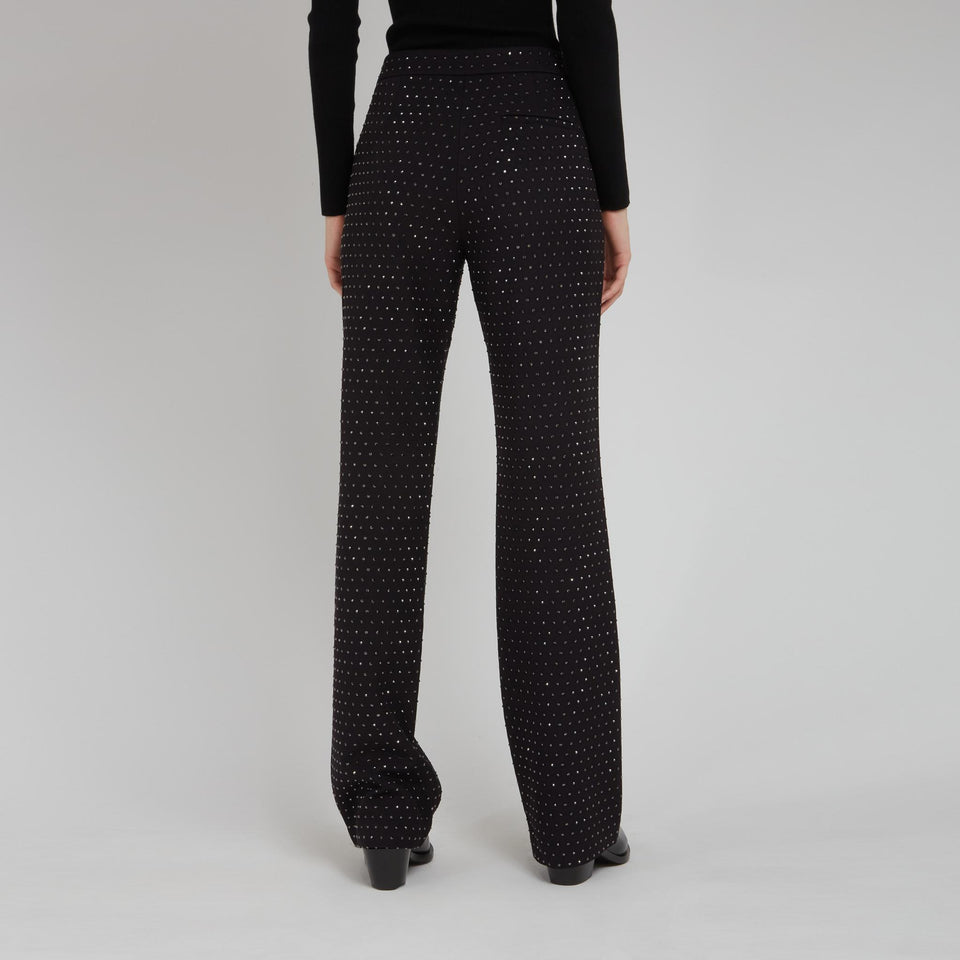 Flared trousers in black fabric