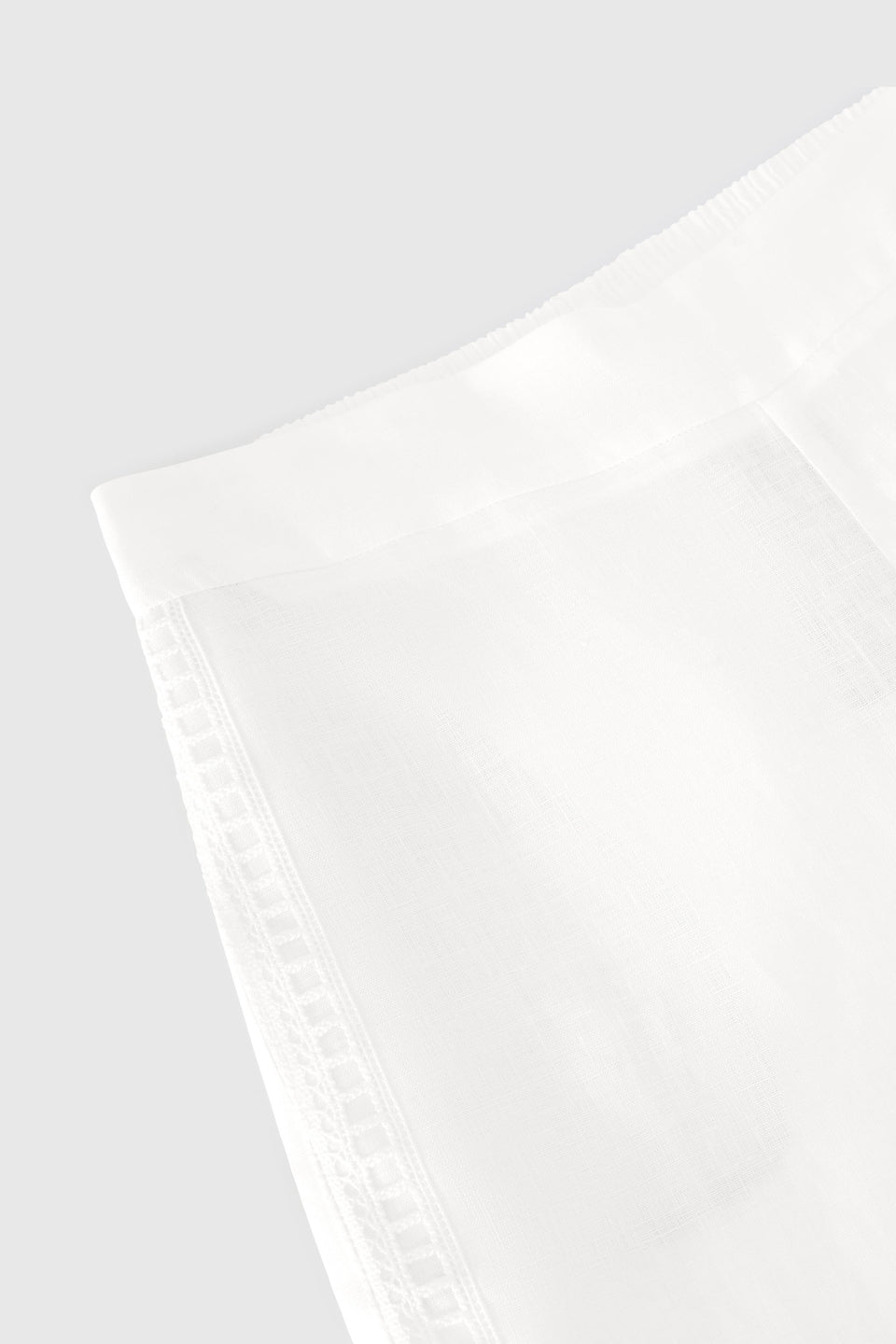 White linen trousers