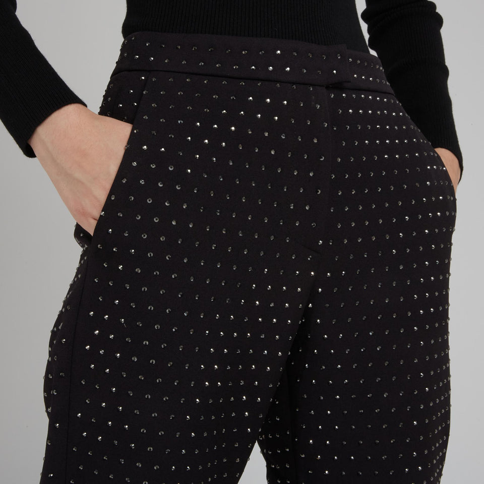Flared trousers in black fabric
