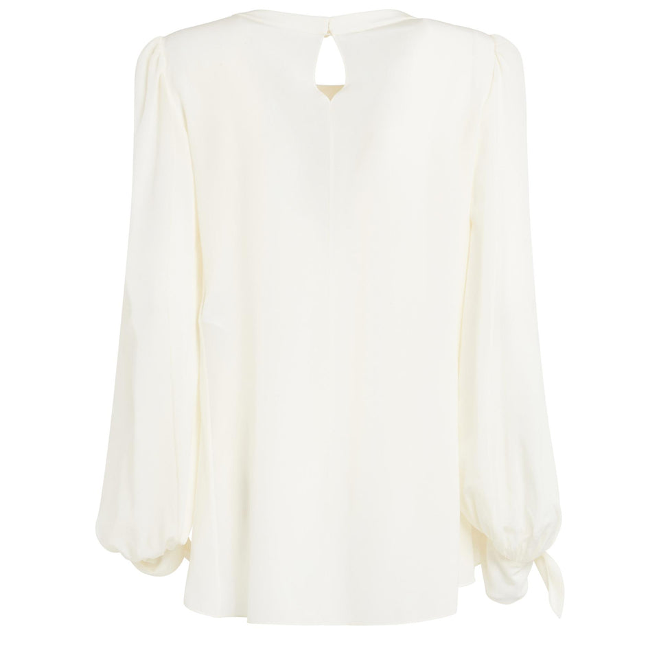 Blusa in seta crema
