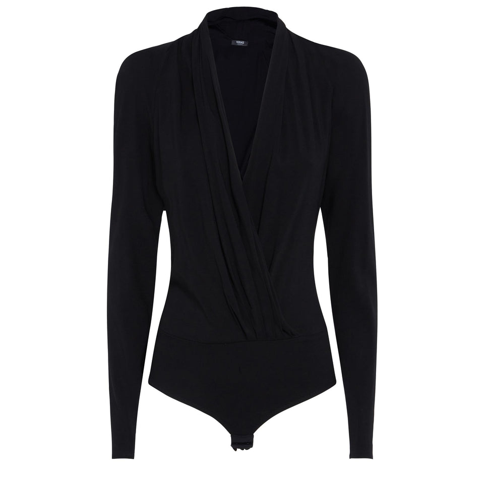 Body in black fabric