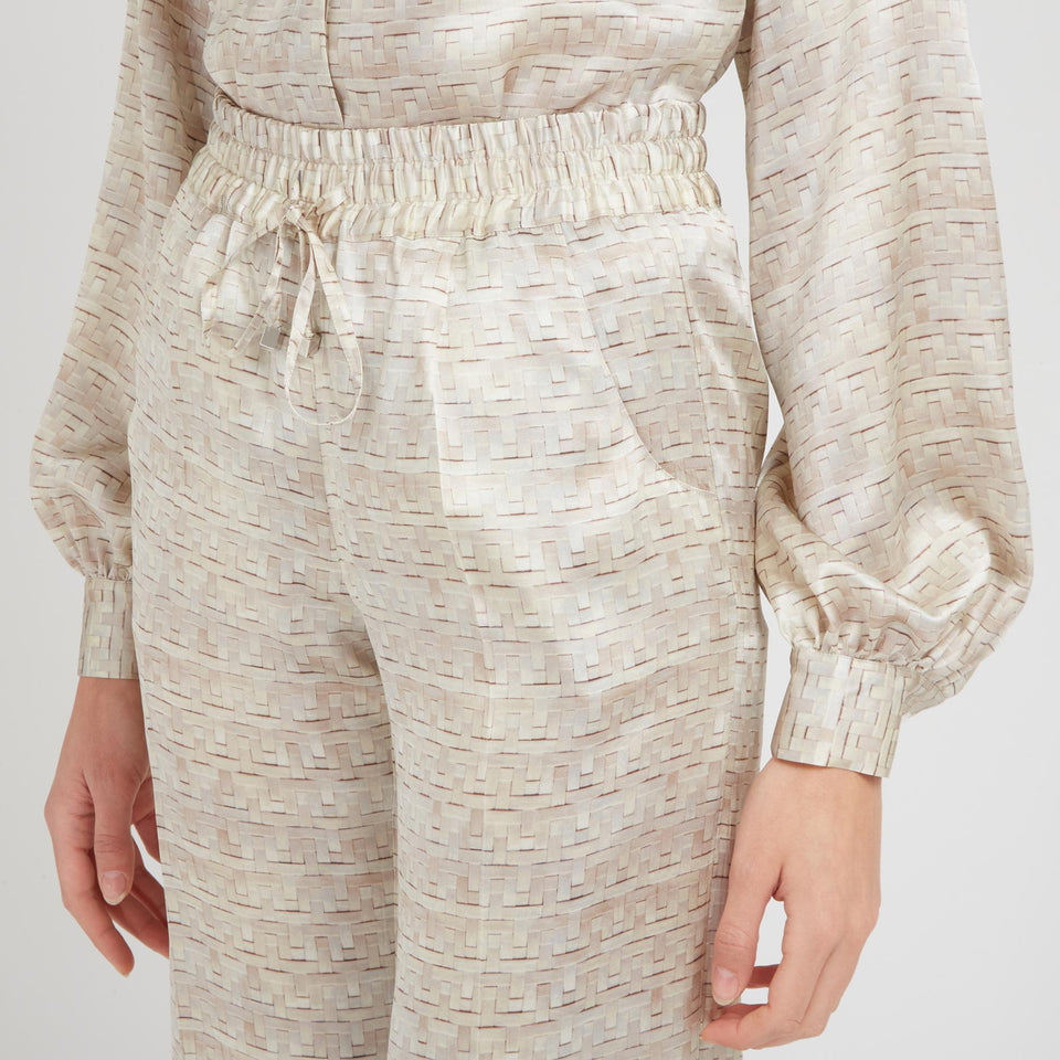 Beige silk trousers
