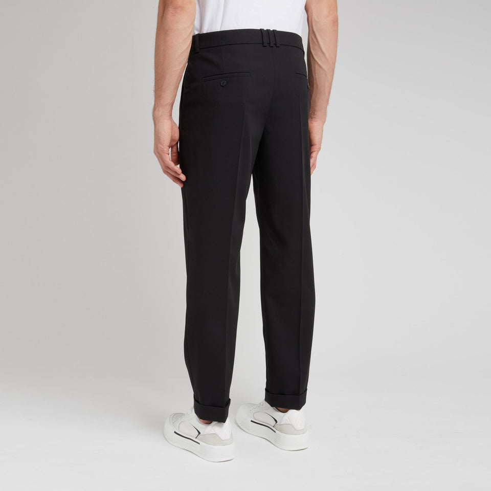 Tailored black wool trousers