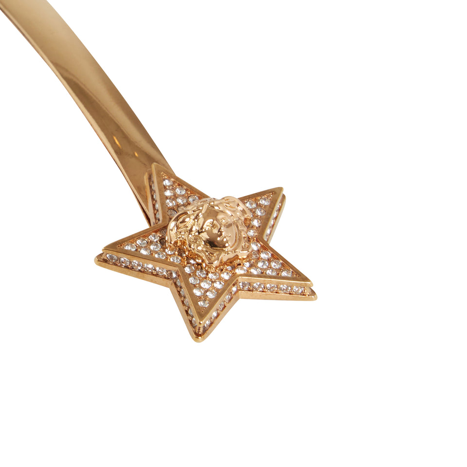Golden metal ''Medusa Star'' brooch
