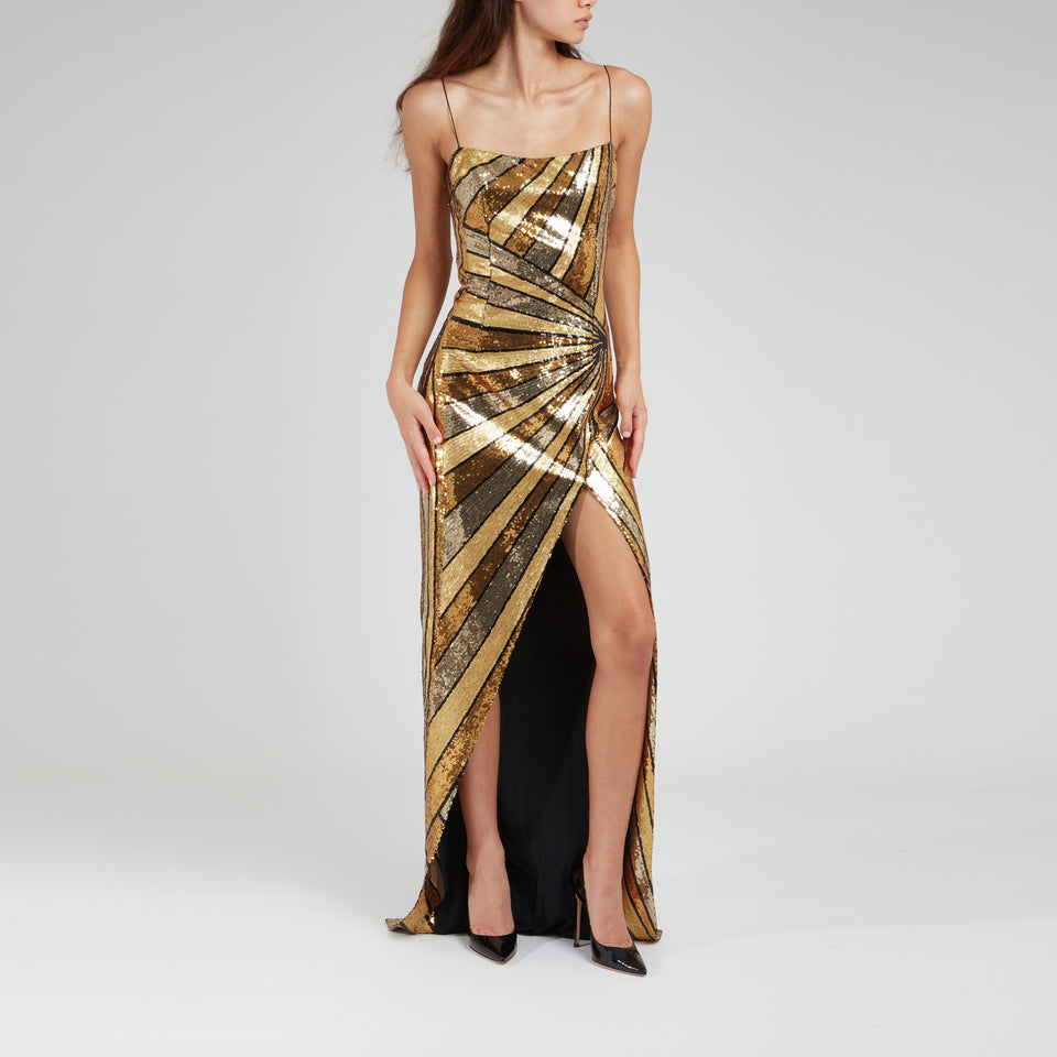 Long dress in gold sequins