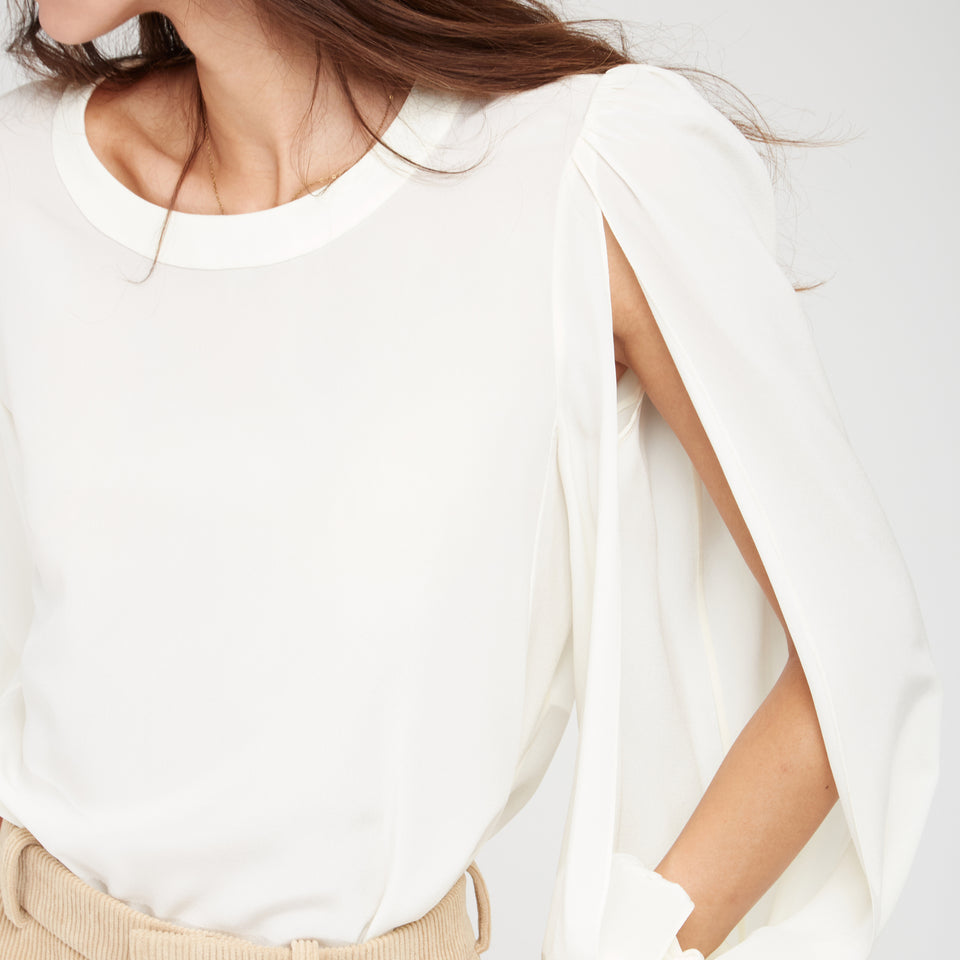 Cream silk blouse