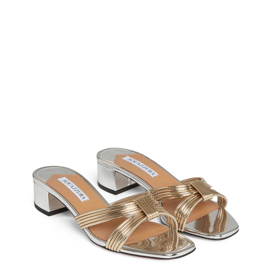 Sandals in gold and silver patent leather