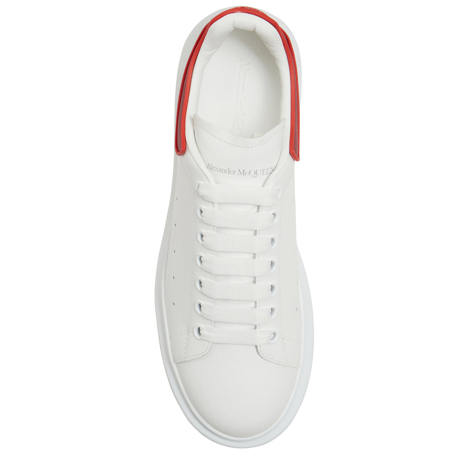 Oversized sneakers in white and red leather