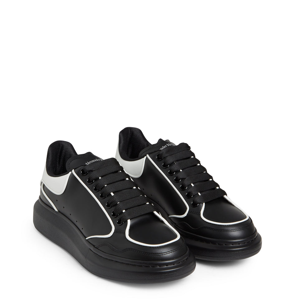 Oversized black leather sneakers