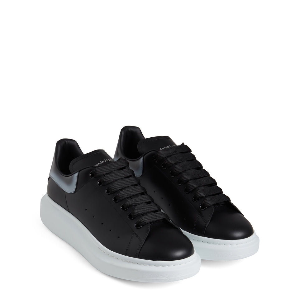 Oversized black leather sneakers
