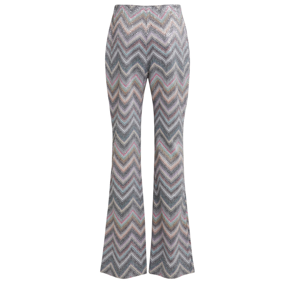 Flared trousers in multicolor fabric