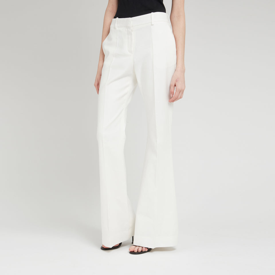 Flared trousers in white cotton